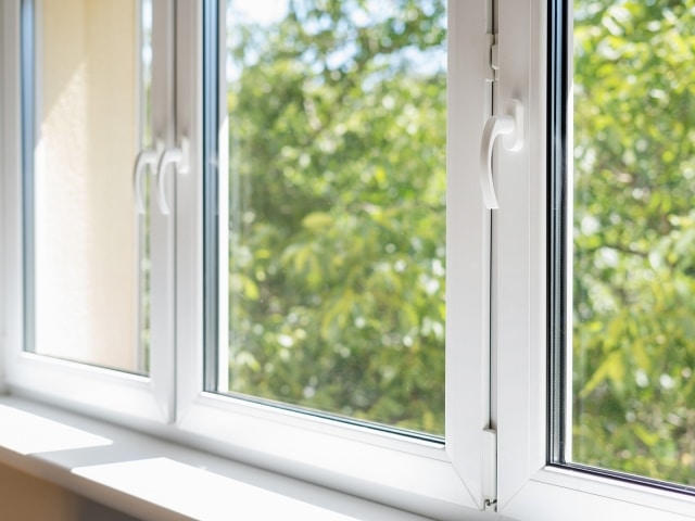closed pvc window in room at apartment