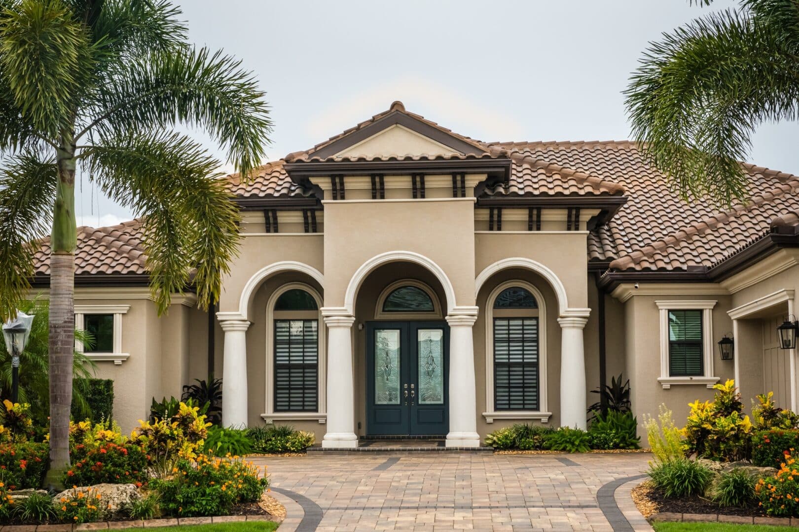 Stunning entry door for curb appeal: Florida home with glass windows and door.